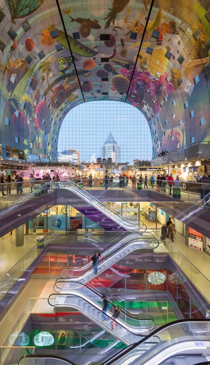 Market hall Rotterdam, decorated with fresh products that are also sold there. Designed by Arno Coenen.