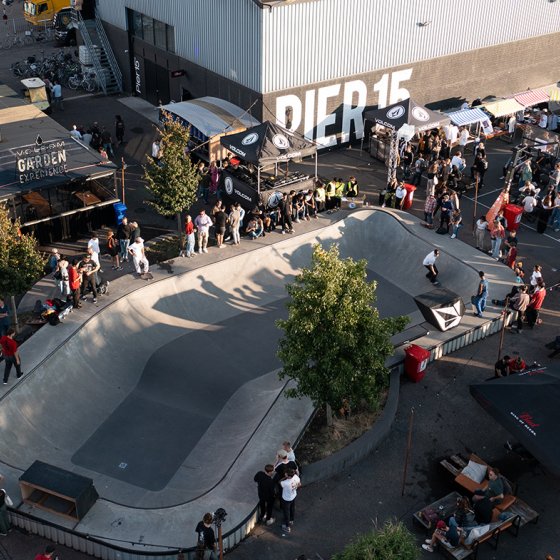 People at a skate rink on pier 15 in Breda