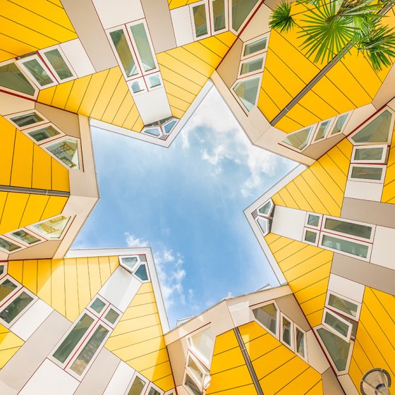 Quirky yellow architecturally unusual angular cube Dutch architect Piet Blom