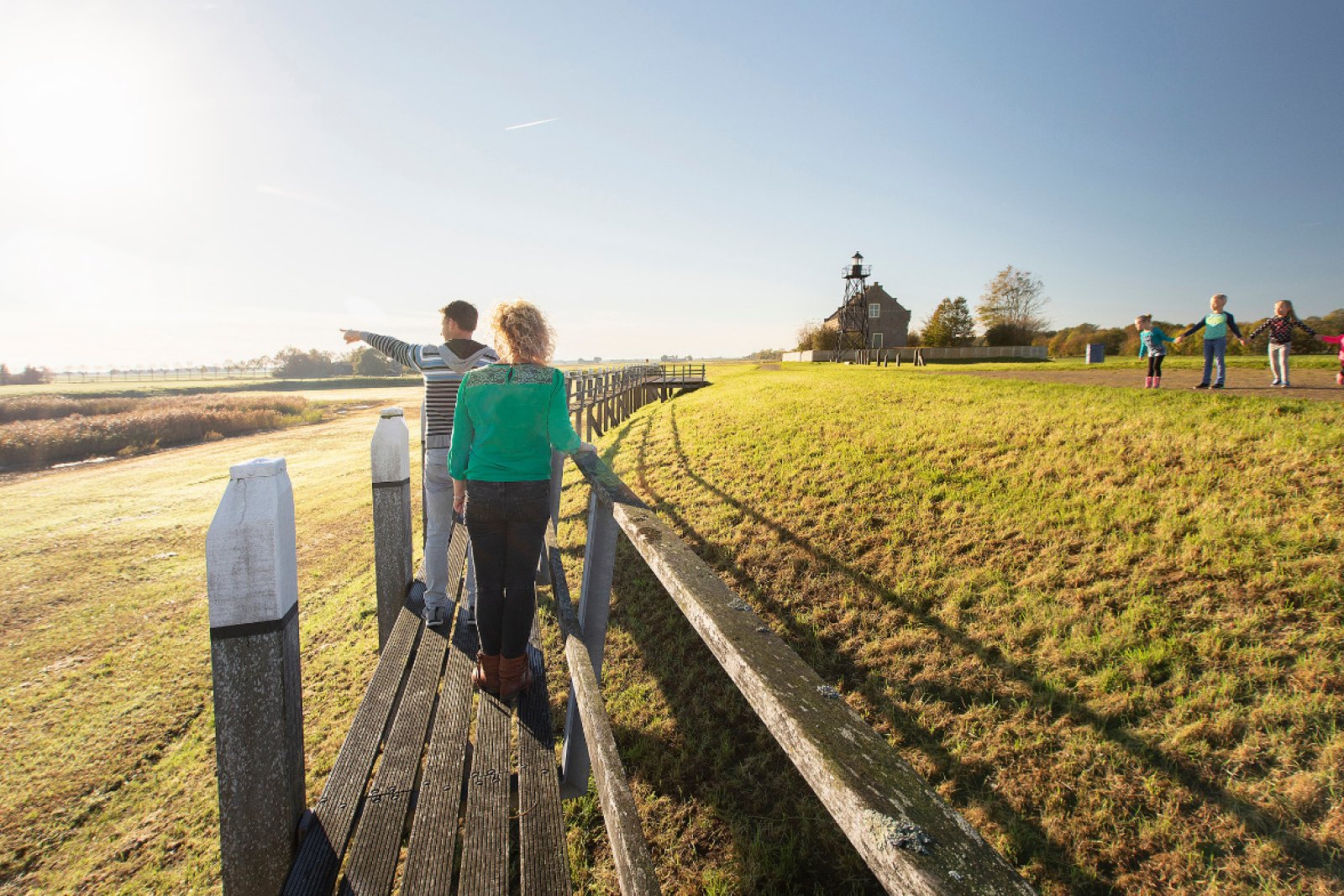 Family in Schokland, looking over noordpunt