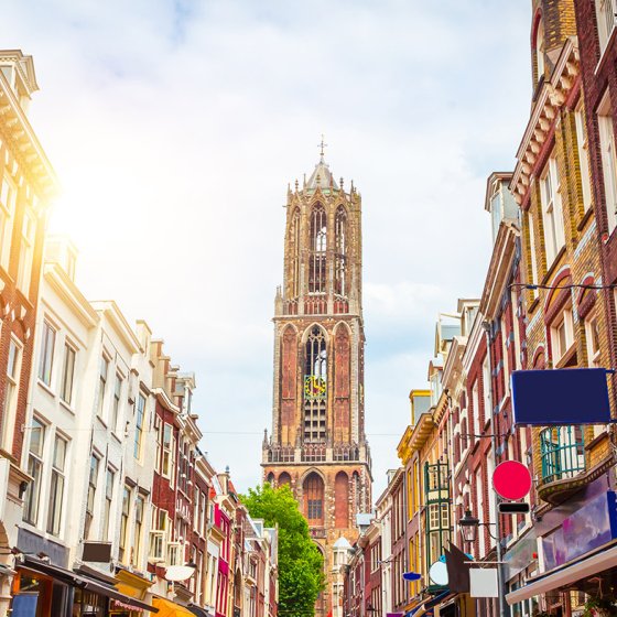 Traditional old buildings and tower of the Dom cathedral in Utrecht