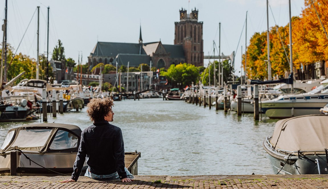 Dordrecht New harbor and Grote Kerk sitting at the water's edge