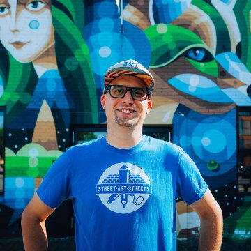 Egbert Scheffer posing for graffiti work