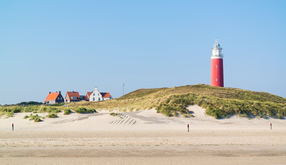 Texel beach with lighthouse