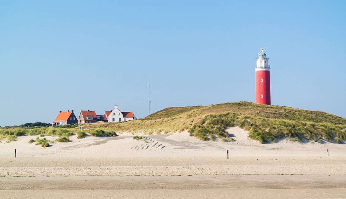 Texel beach with lighthouse Texel beach with lighthouse