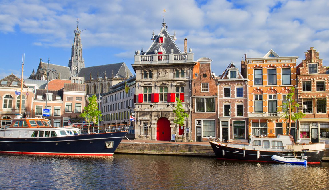 Canal with historical houses in old Haarlem Canal with historical houses in old Haarlem