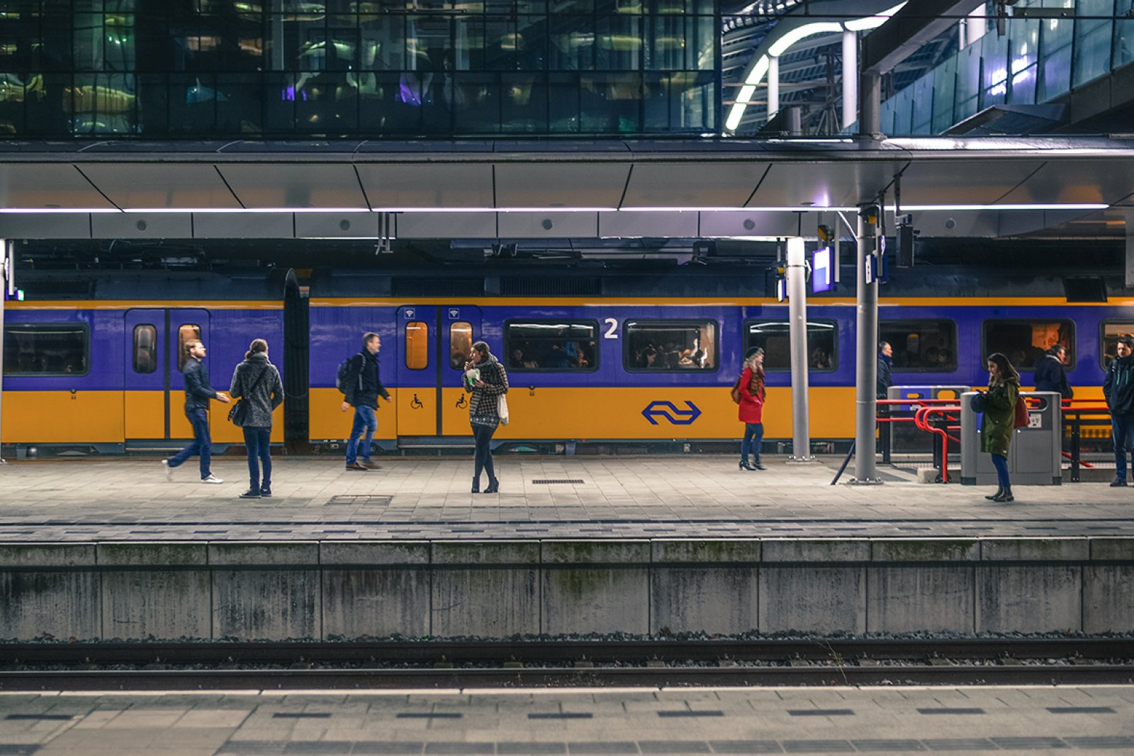 Utrecht central station, people waiting for train