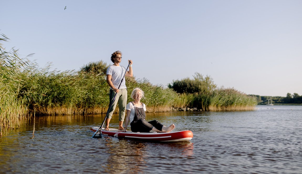 Couple supping on the Lauwersmeer