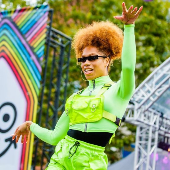 Performer dancing on stage during Rotterdam Pride celebrations
