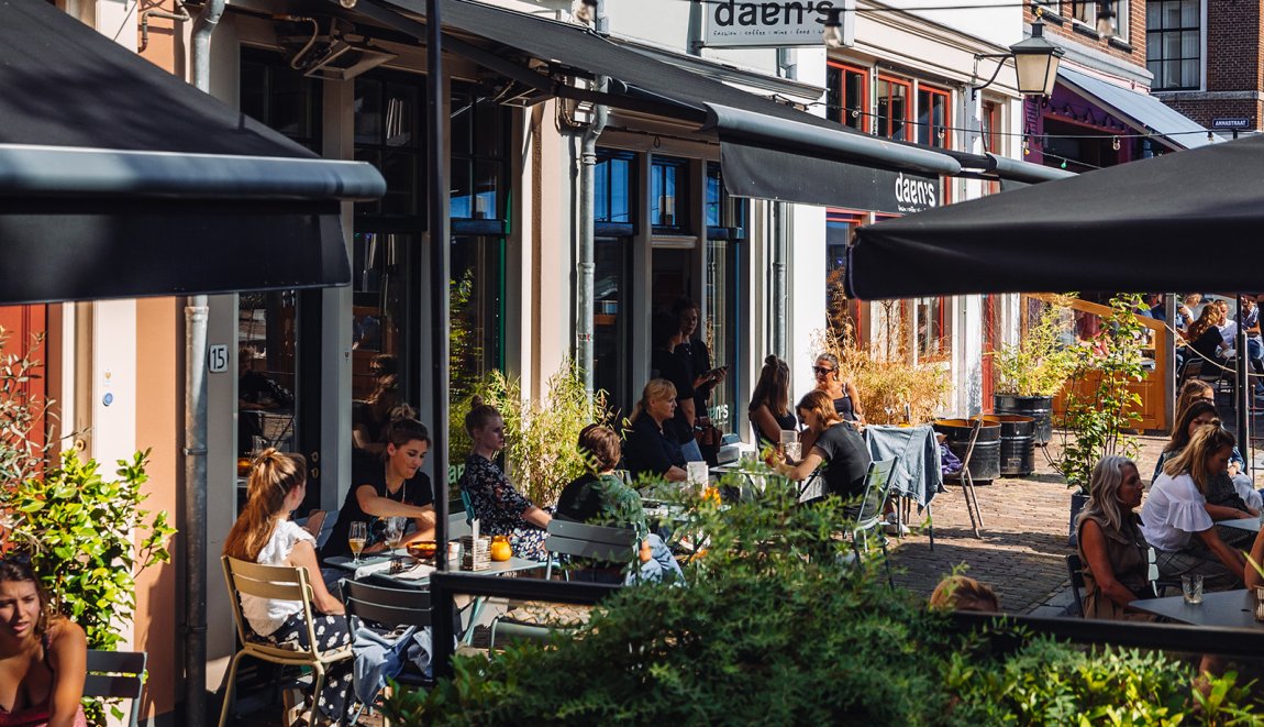 People sitting outside on the terrace Utrecht People sitting outside on the terrace Utrecht