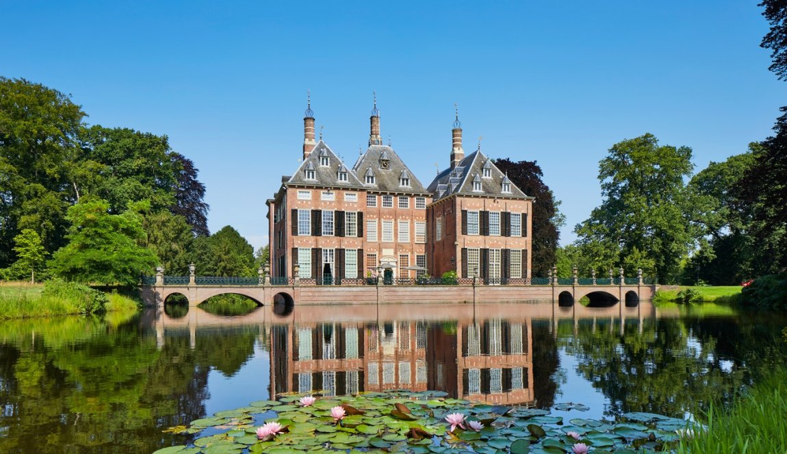 Exterior of Duivenvoorde Castle with pond