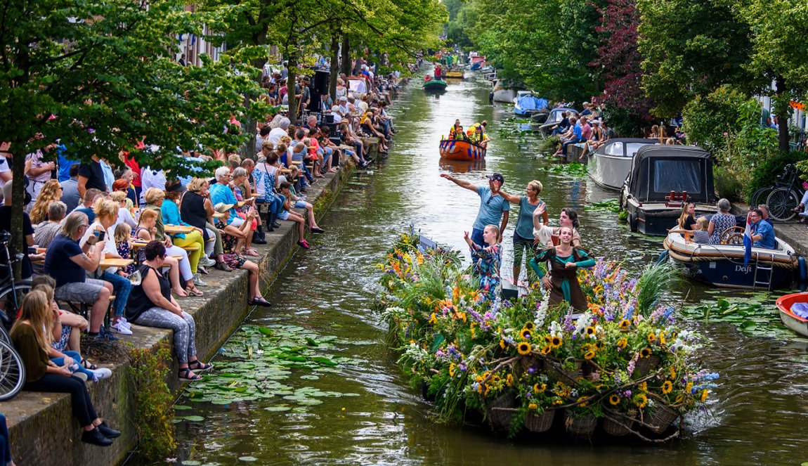 Corso Westland boat parade through canal in Delft