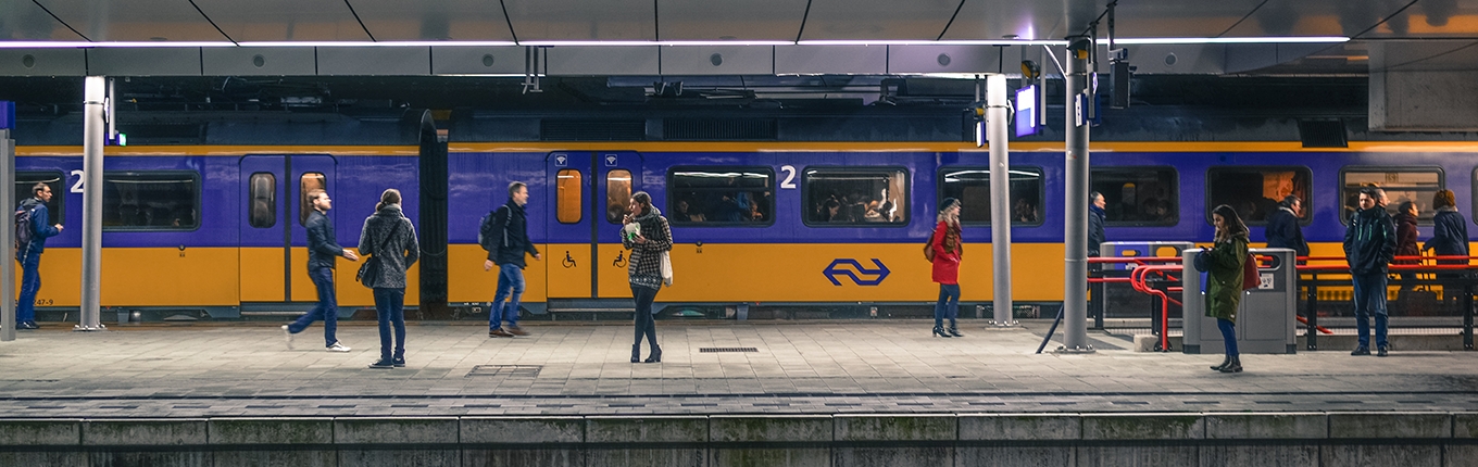 Utrecht central station, people waiting for train Utrecht central station, people waiting for train