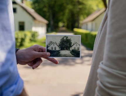 People holding a photo People holding a photo