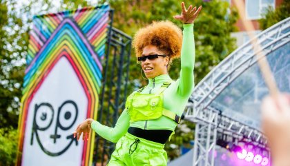 Performer dancing on stage during Rotterdam Pride celebrations