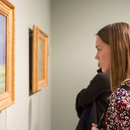 Women looking at a painting at the Van Gogh Museum in Amsterdam