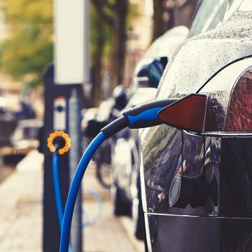 Electric car charging in the street of Amsterdam