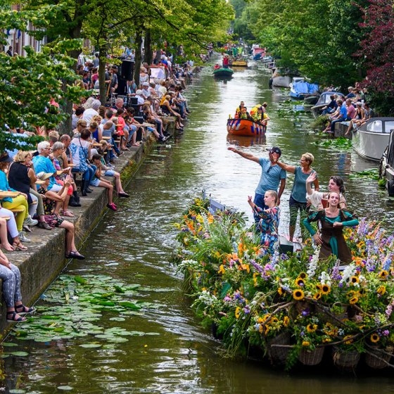 Corso Westland boat parade through canal in Delft