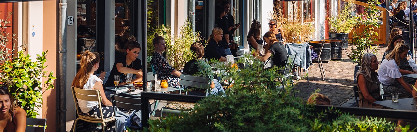 People sitting outside on the terrace Utrecht