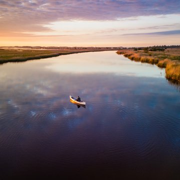 Canoe at evening light in Lauwersmeer National Park