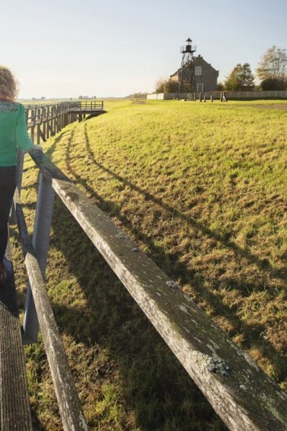 Family in Schokland, looking over noordpunt Schokland