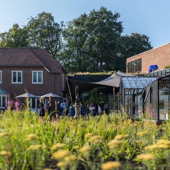 Visitors exploring Singer Laren, where art and nature come together