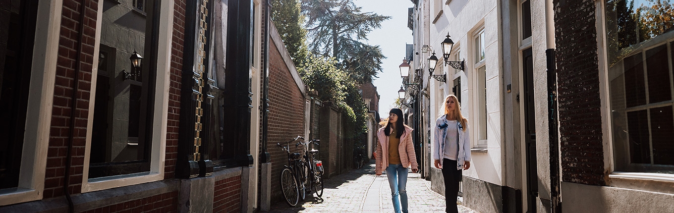 Ladies walk through historic Hoorn Ladies walk through historic Hoorn