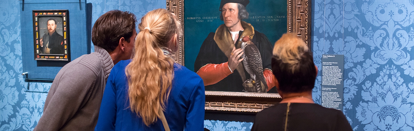 People looking at paintings in Mauritshuis Den Haag People looking at paintings in Mauritshuis Den Haag