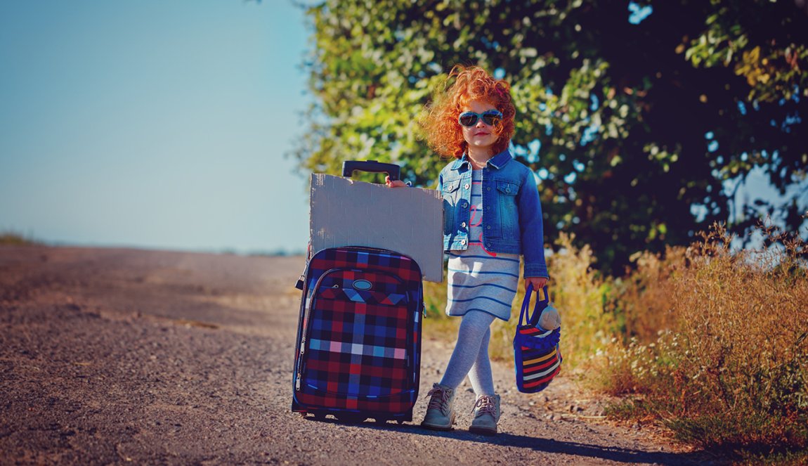Little girl with suitcase Little girl with suitcase