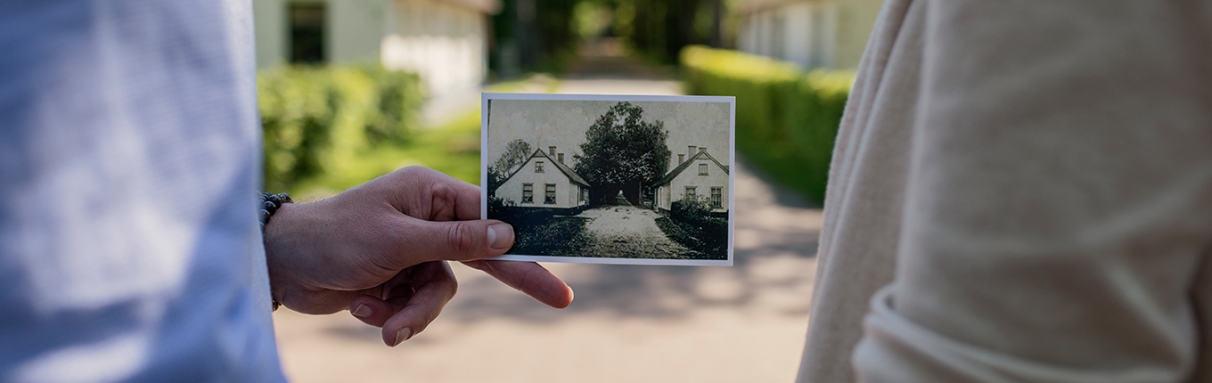 People holding a photo People holding a photo