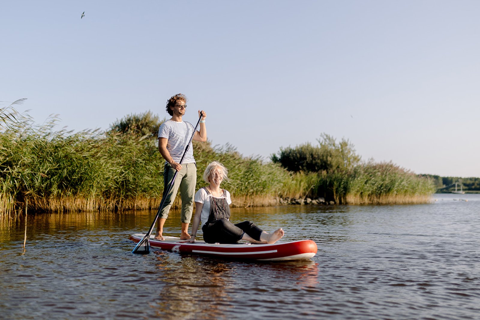 Couple supping on the Lauwersmeer