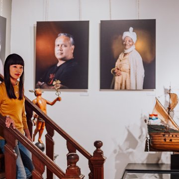 Westfries Museum lady comes down stairs