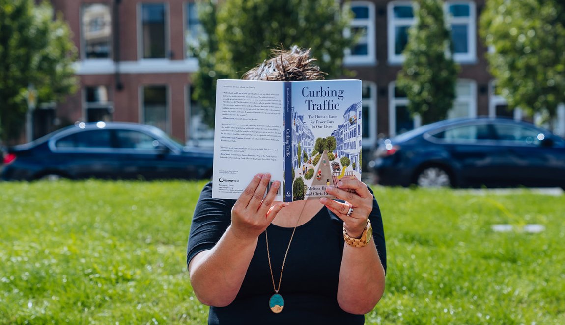 Melissa Bruntlett with her book Curbing Traffic